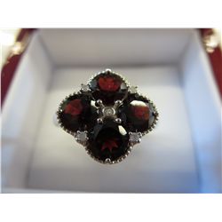 Garnet ring set with 5 diamonds in silver