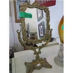 Tilting brass makeup mirror