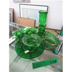Five pieces of green glass