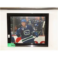 Autographed hockey photo "Jordan Schroeder"