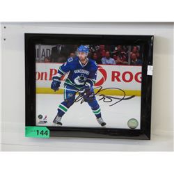 Autographed hockey photo "Chris Higgins"