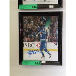Autographed hockey photo "Manny Malhotra"