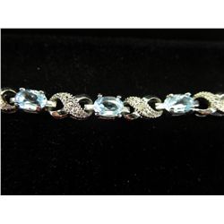 Blue Topaz & diamond tennis bracelet