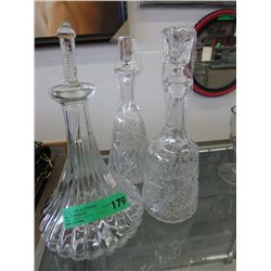 3 pressed glass decanters, with stoppers