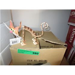 Box containing 4 metal cat figurines