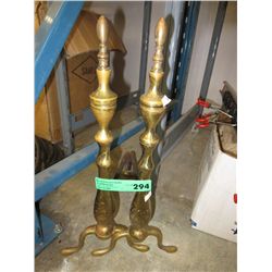 A pair of brass andirons