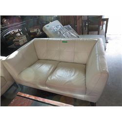 Contemporary leather loveseat and sofa by Natuzzi