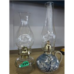 Two hurricane lamps