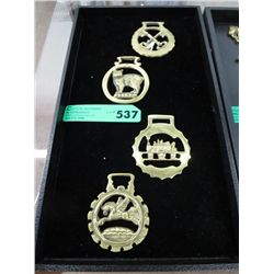 Four horse brasses