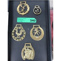 Four horse brasses