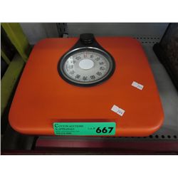 Orange bathroom scale