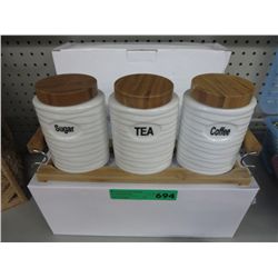Four cannister sets of bamboo trays