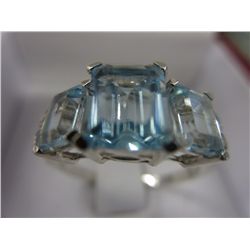 Blue topaz & diamond ring set in .925 silver