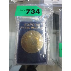 Two Expo '86 official medallions