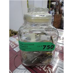 Jar of coins and tokens, sealed