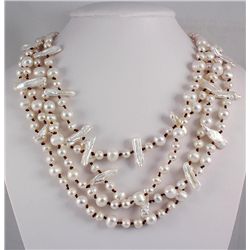 PRETTY WHITE 674.00CTW FW PEARL NECKLACE W/ BOTTON LOCK