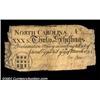 Image 1 : North Carolina March 9, 1754 30s Fine. Although there are some pieces missing from the edge as well.