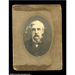 Photograph of Marcus W. Baldwin. An oval photograph, mounted on cardstock measuring approximately 6"