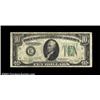 Image 1 : Fr. 2009-E* $10 1934D Federal Reserve Note. Very Fine-Extremely Fine.An extremely rare star from a d