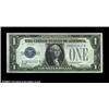 Image 1 : Fr. 1603 $1 1928C Silver Certificate. About Uncirculated.Flat, as are all of the 1928C examples in t