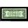 Image 2 : Fr. 1603 $1 1928C Silver Certificate. About Uncirculated.Flat, as are all of the 1928C examples in t