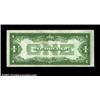 Image 2 : Fr. 1603 $1 1928C Silver Certificate. About Uncirculated.The middle note in the run, and a particula