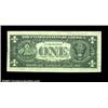 Image 2 : Fr. 1909-C $1 1977 Federal Reserve Note. Very Fine.A near-horizontal gutter fold diagonally crosses.