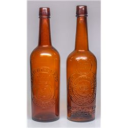 Jesse Moore Whiskey Bottle Pair -