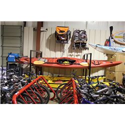 RED TORNAK SINGLE PERSON KAYAK WITH AQUA BOUND PADDLE AND LIFE JACKET