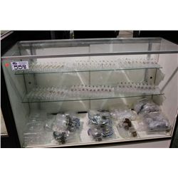 CONTENTS OF SHOWCASE: LARGE ASSORTMENT OF VARIOUS PIPE SYSTEMS AND ACCESSORIES