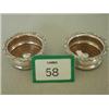 Image 1 : Pair of silver plated on copper half bottle coasters with turned wood centres and decorative edgi…