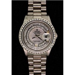ROLEX: Mens 18kw Rolex O.P. Day Date wristwatch w/ aftmkt diamond apptmnts; white MOP dial; dial bez