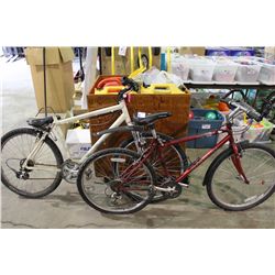 2 BIKES: RED NISHIKI MOUNTAIN BIKE & WHITE NO NAME FRONT SUSPENSION MOUNTAIN BIKE