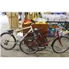 Image 1 : 2 BIKES: RED NISHIKI MOUNTAIN BIKE & WHITE NO NAME FRONT SUSPENSION MOUNTAIN BIKE