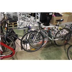 2 BIKES: WHITE DIAMONDBACK MOUNTAIN BIKE & GREEN MCKINLEY MOUNTAIN BIKE