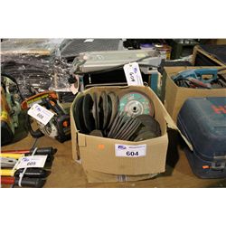 BOX OF ASSORTED GRINDING DISCS AND ROUTER BENCH