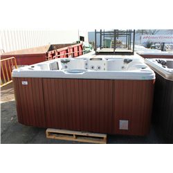 CAL SPAS ESCAPE SELECT SERIES HOT TUBE WITH SAHARA INTERIOR AND 8' MAHOGANY CABINET. C/W: