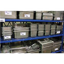 SHELF OF METAL INSERT TRAYS