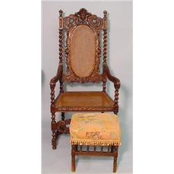 CARVED ENGLISH  ARMCHAIR AND A FOOTSTOOL