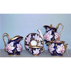 EIGHT-PIECE GERMAN PORCELAIN TEA SET