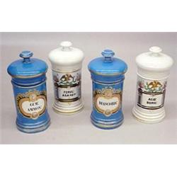 GROUP OF FOUR EARLY PORCELAIN APOTHECARY JARS