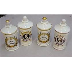 GROUP OF FOUR APOTHECARY JARS