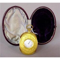 ENGRAVED OVAL TRAVEL CLOCK WITH FITTED CASE