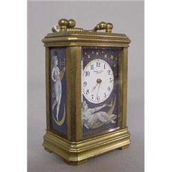 DIMINUTIVE BRASS AND ENAMEL CARRIAGE CLOCK WITH CELESTIAL MOTIF