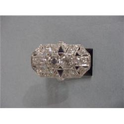 PLATINUM, DIAMOND, AND SAPPHIRE ELONGATED LADIES' RING