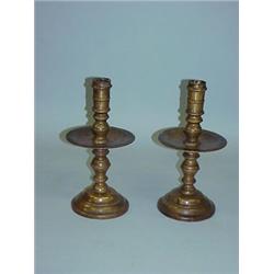 PAIR OF BRASS CANDLESTICKS WITH MID-COLUMN DRIP PANS