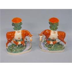 PAIR OF STAFFORDSHIRE COW AND CALF CHIMNEY VASES