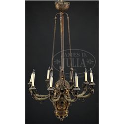 OUTSTANDING CAST BRASS CALDWELL STYLE EIGHT-BRANCH FIGURAL CHANDELIER.