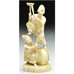 CARVED IVORY JESTERS.