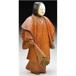 CARVED FIGURE OF A WOMAN WITH MASK.